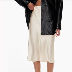 Brand New Aritzia satin beige midi skirt